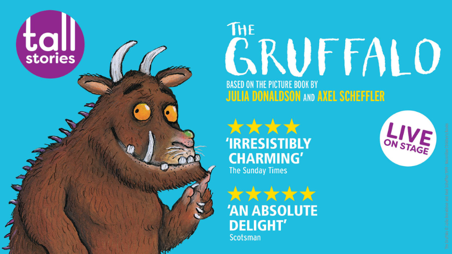 The Gruffalo 2024 Artwork. Sky blue background with the Gruffalo pictured with brown fur, orange eyes, purple spikes and tusks.